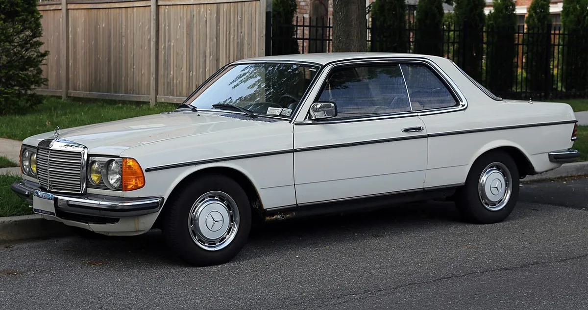 A 1977 Mercedes-Benz 230C coupe in the US with European headlights and bumpers