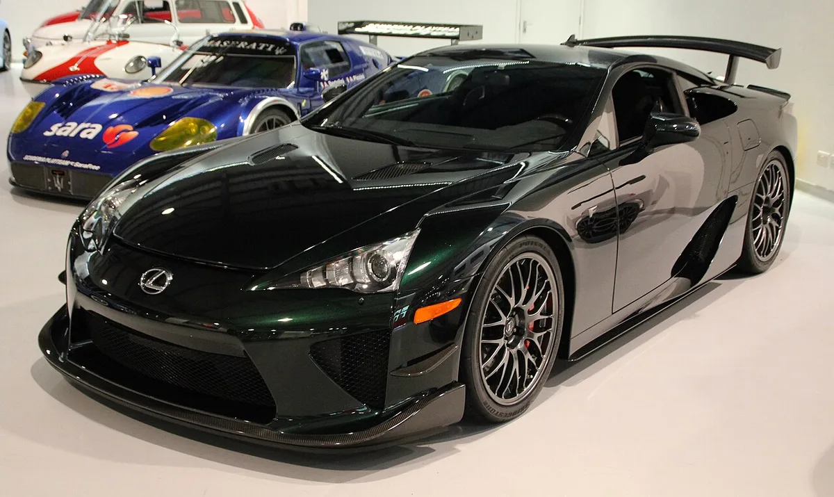 A green 2012 Lexus LFA Nürburgring Package with its fixed rear wing and front canards