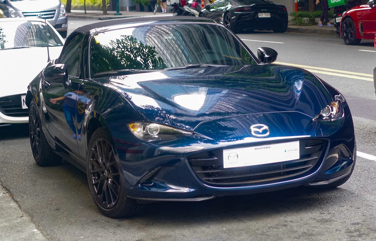A Deep Crystal Blue ND Mazda MX-5 soft top