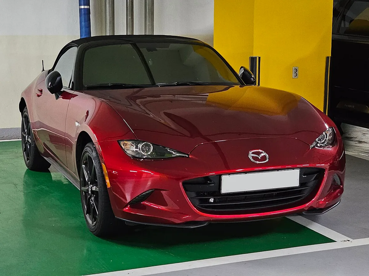 A Soul Red Crystal Metallic ND Mazda MX-5 Miata soft top