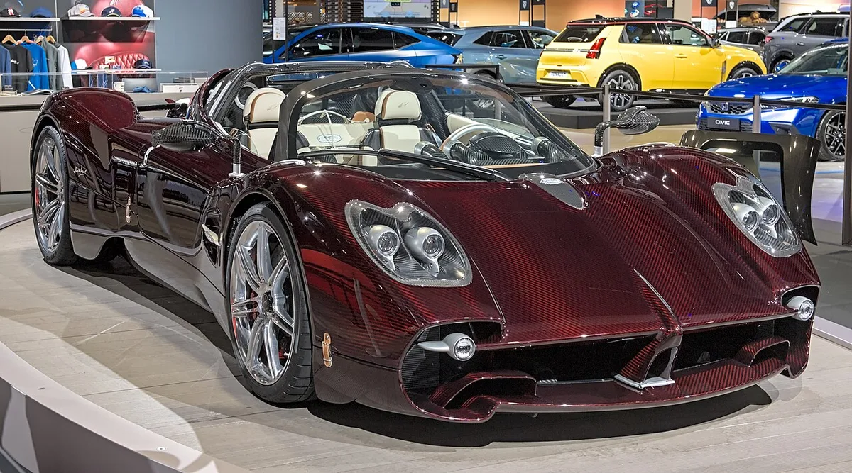 A dark red Pagani Utopia Roadster from the front three-quarter view