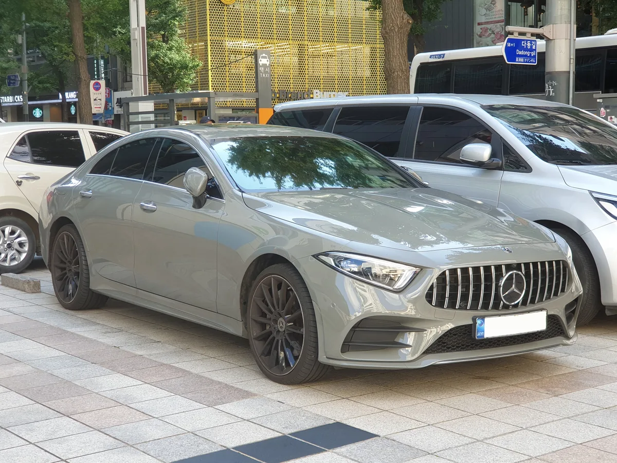 A Mercedes-Benz CLS 450 in a solid non-metallic gray paint