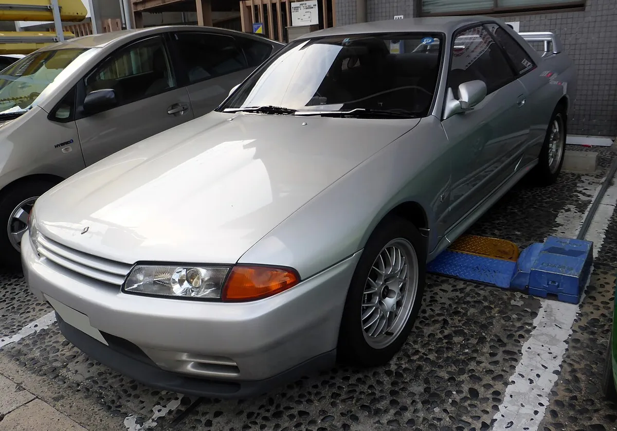 A silver R32 Nissan Skyline GT-R from the front