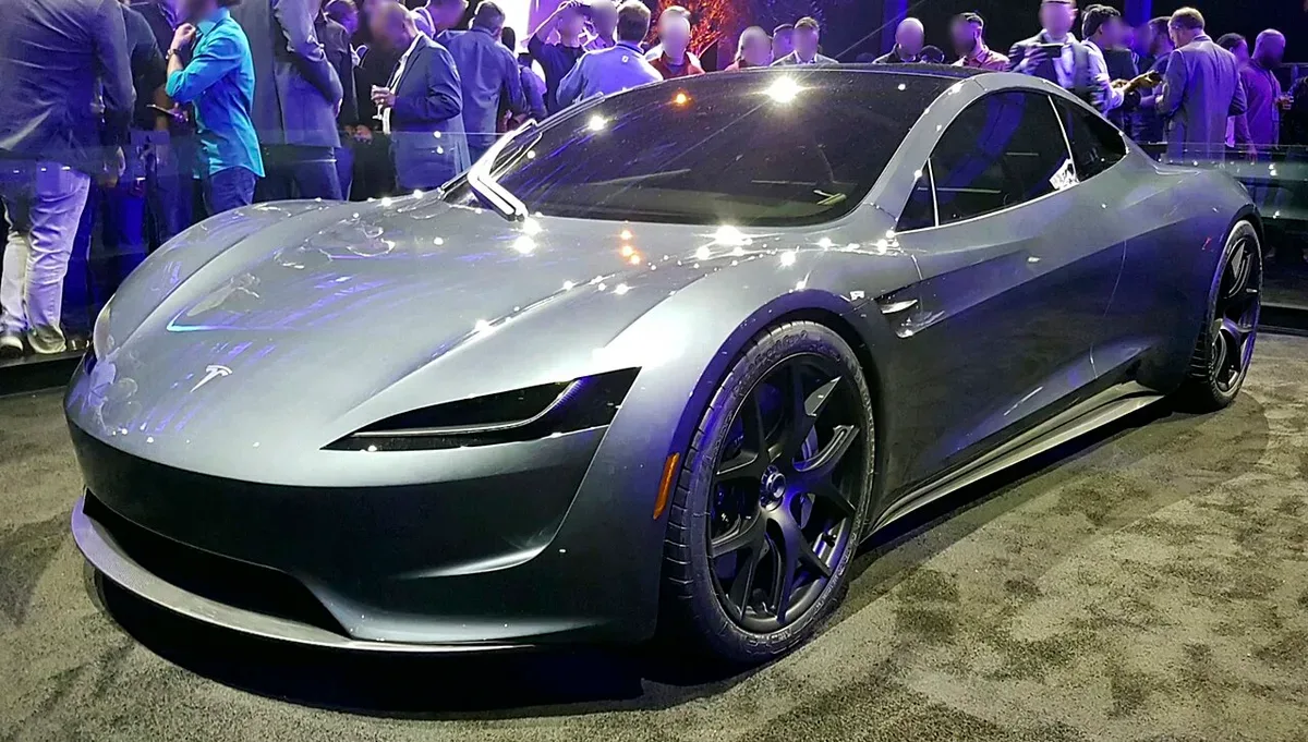 The silver 2017 Tesla Roadster concept with rounded bodywork at its November 2017 launch event